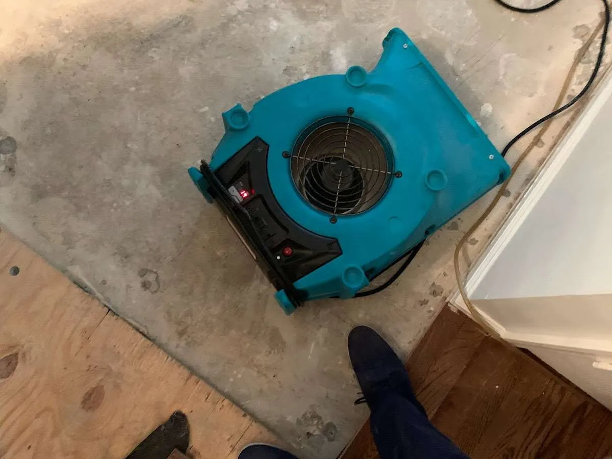 Air mover drying subfloor during Leak Detection & Repair in East Whittier